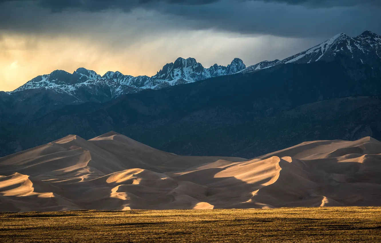 Photo wallpaper the storm, field, clouds, snow, mountains, dunes