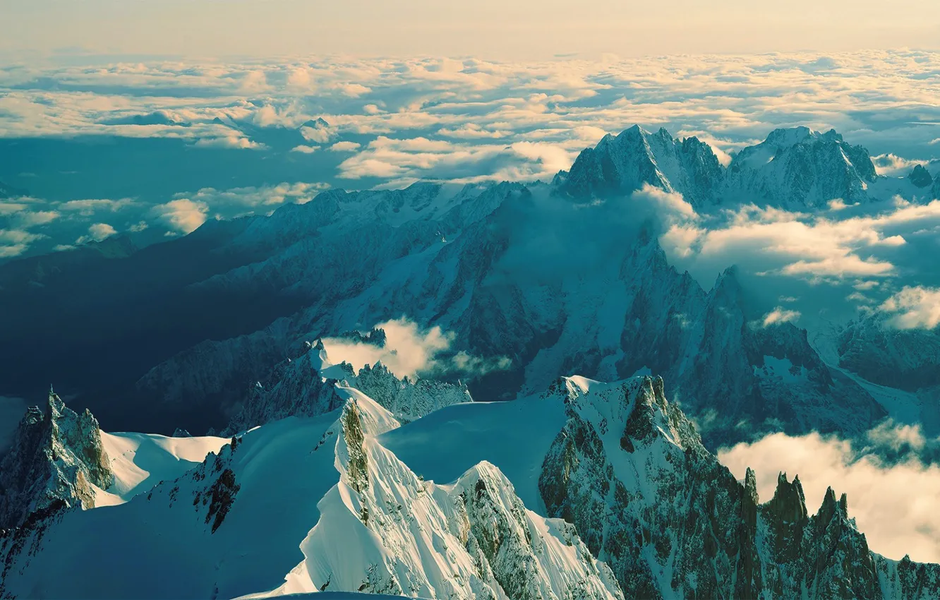 Photo wallpaper clouds, mountains, tops, slope, ridge