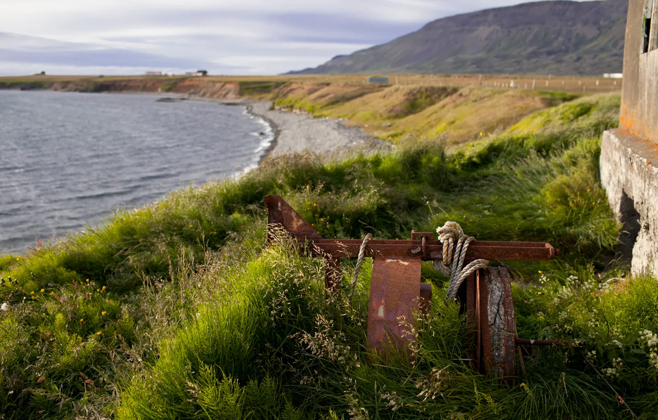 Photo wallpaper sea, grass, shore, rope, Iceland, building, a piece of iron