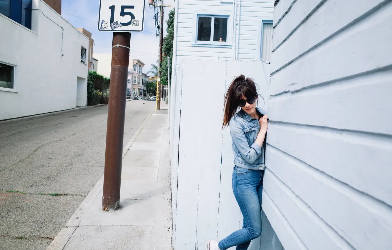 Photo wallpaper girl, pose, street, brunette, glasses, jeans