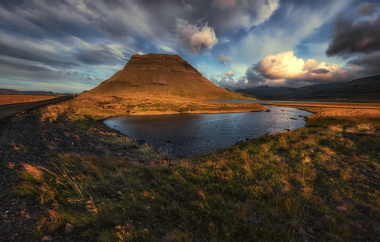 Photo wallpaper lake, mountains, grass, the sky, shore, clouds