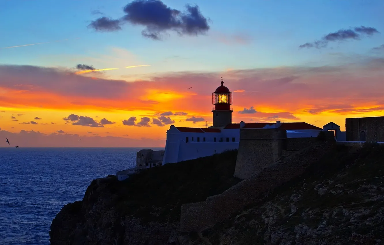 Photo wallpaper clouds, sunset, lighthouse