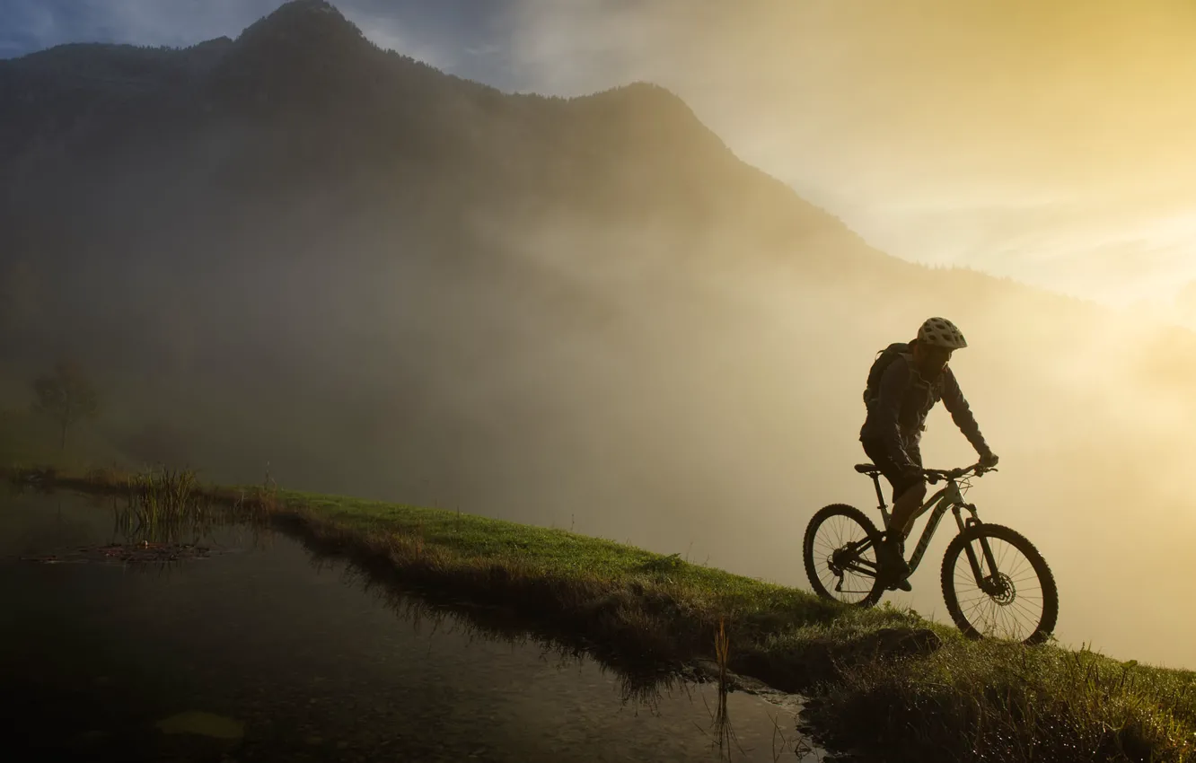 Photo wallpaper mountains, fog, morning, cyclist