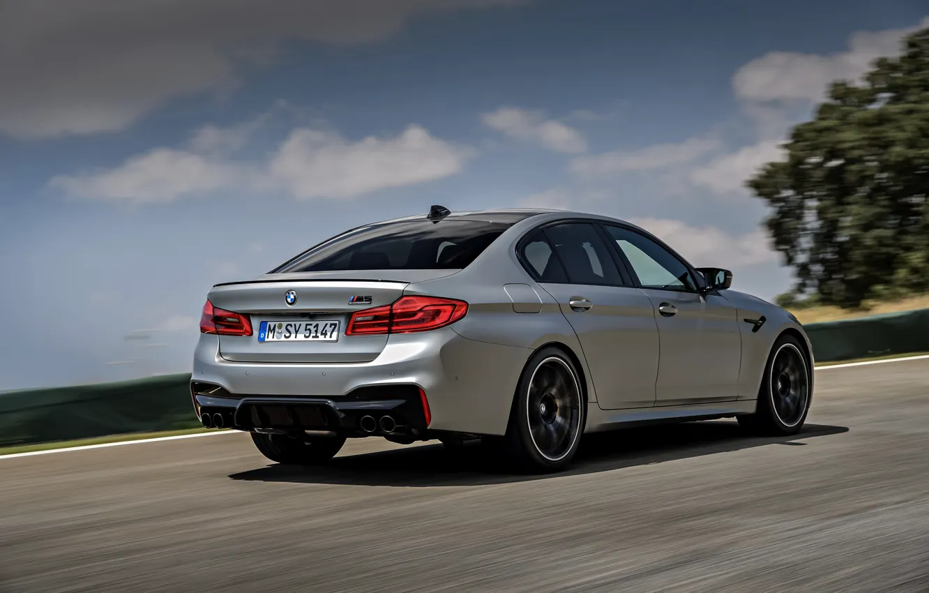 Photo wallpaper the sky, asphalt, clouds, grey, BMW, sedan, side, rear view