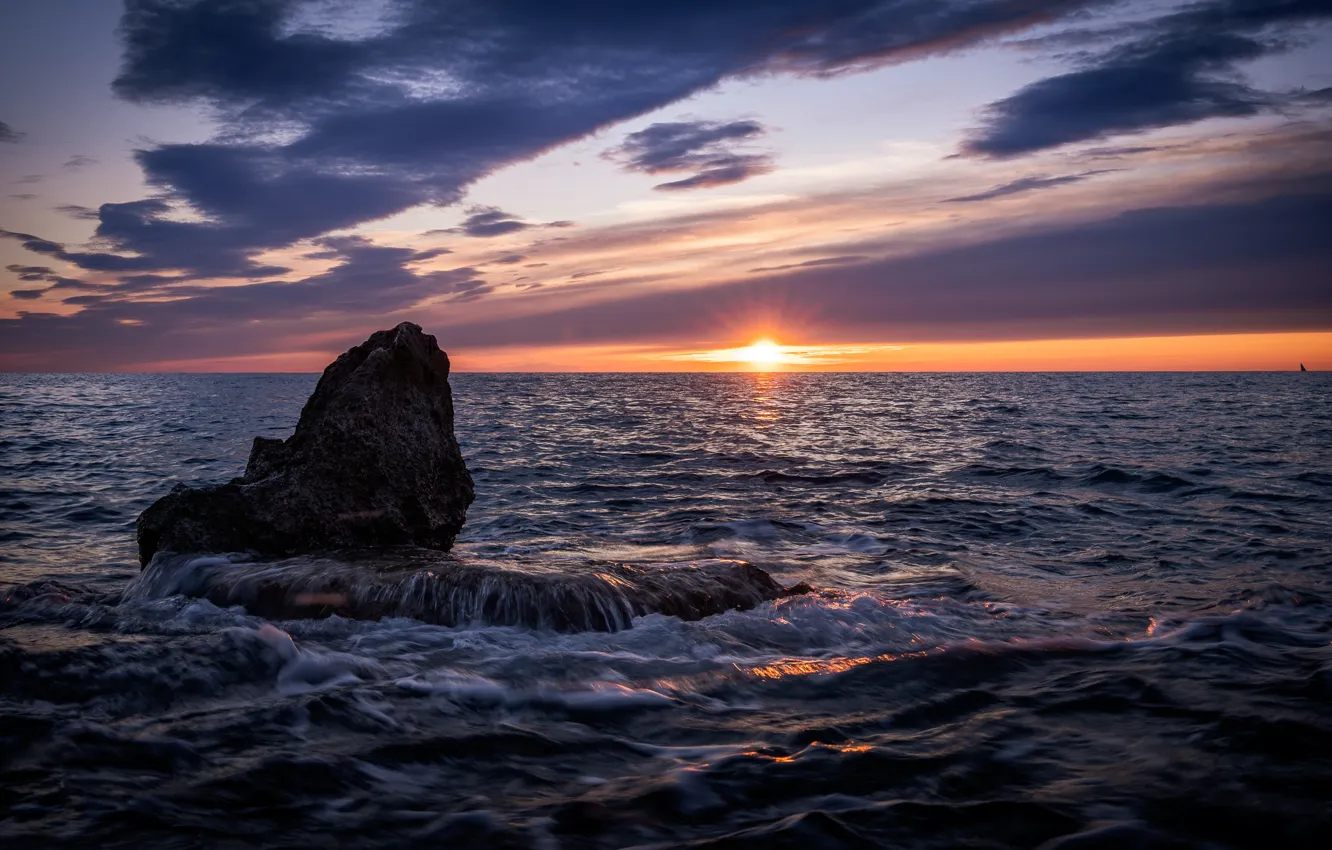 Photo wallpaper stones, rays, dawn, sea, the sun, the sky, horizon, clouds