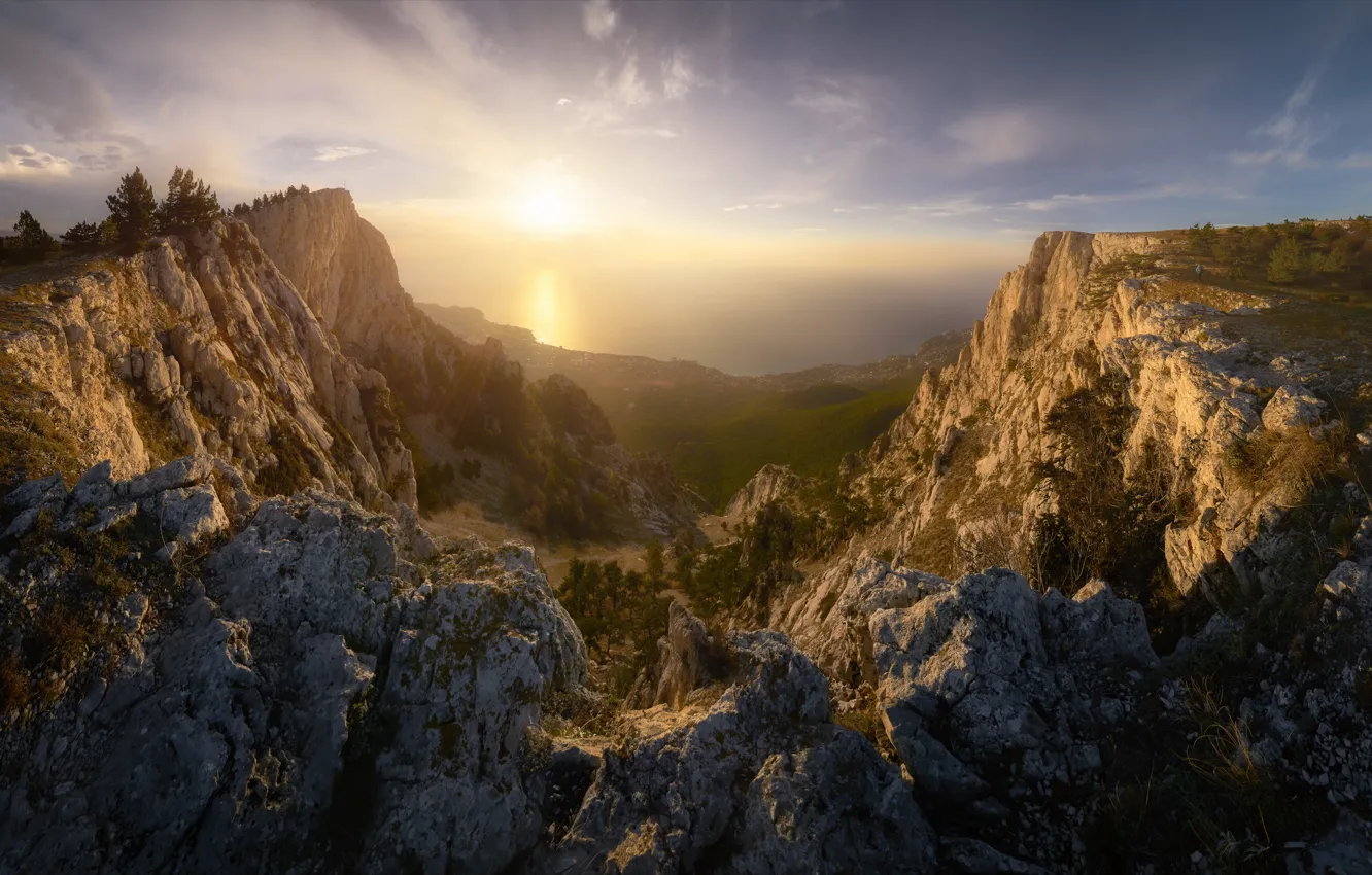 Photo wallpaper the sky, the sun, clouds, rays, light, mountains, fog, stones