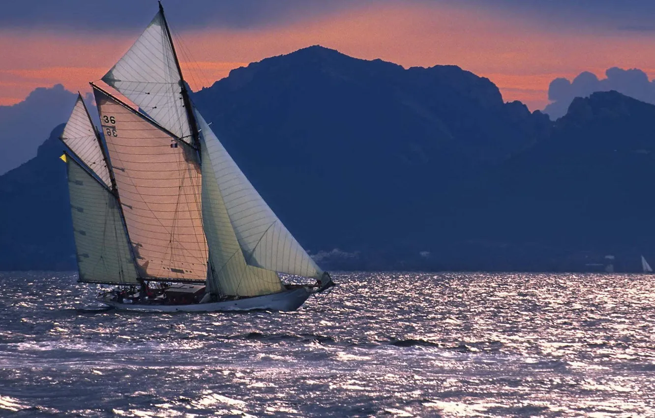 Photo wallpaper sea, sunset, mountains, the way, the wind, coast, ship, sailboat