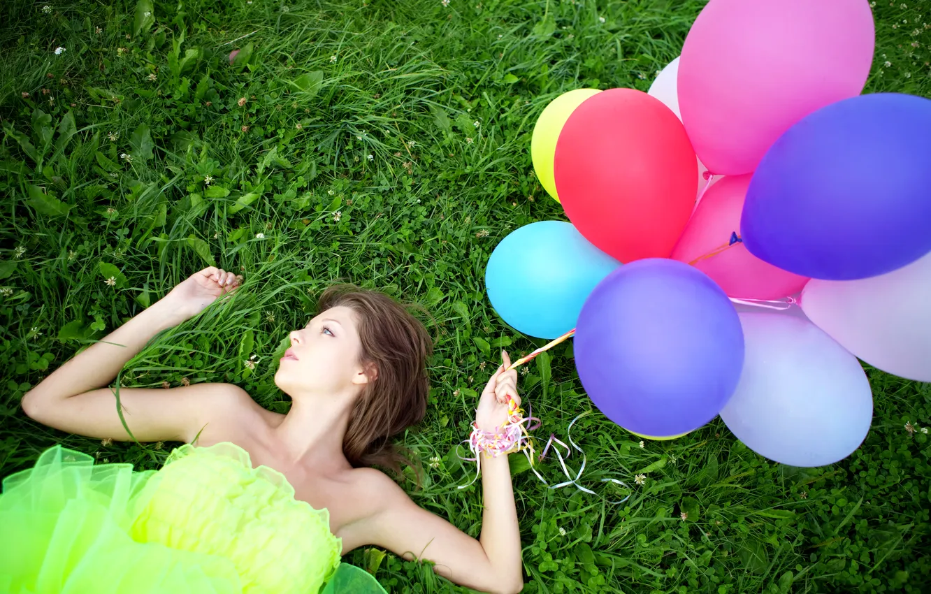 Photo wallpaper grass, girl, balloons, tape, clover, profile, brown hair, blue-eyed