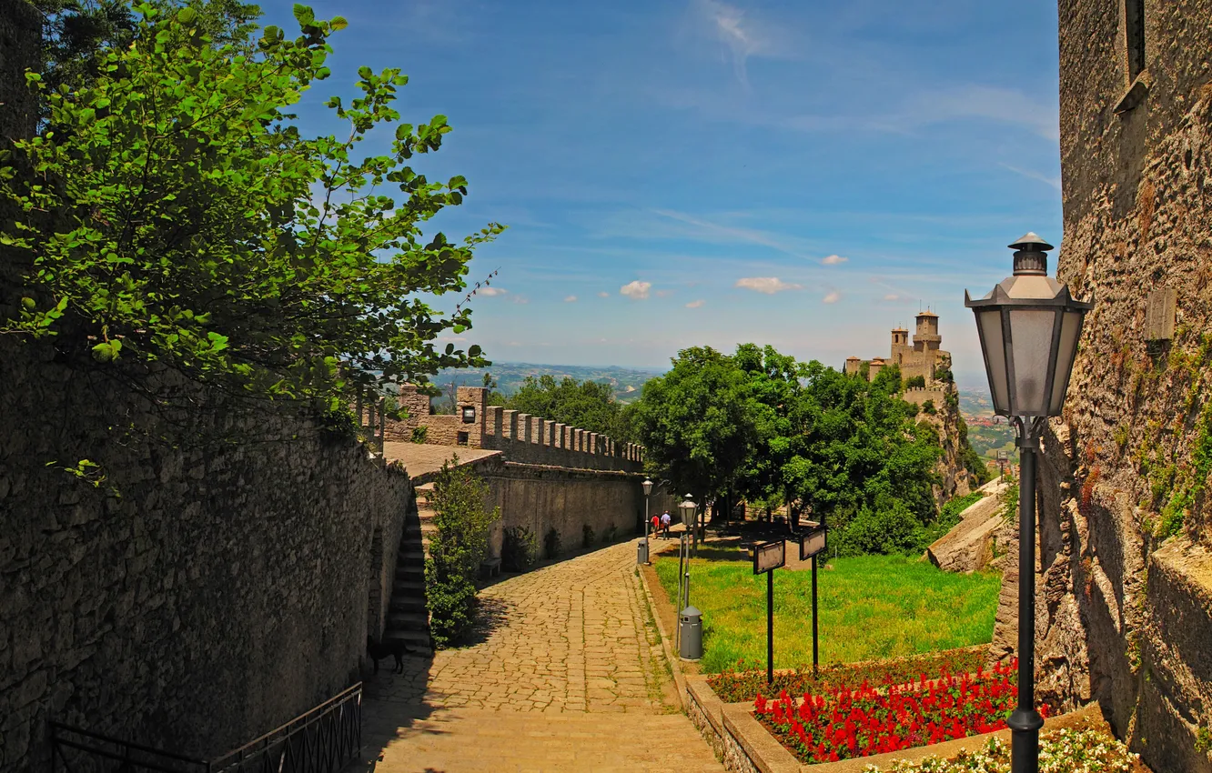 Photo wallpaper flowers, mountains, wall, tower, lights, fortress, San Marino, Monte Titano