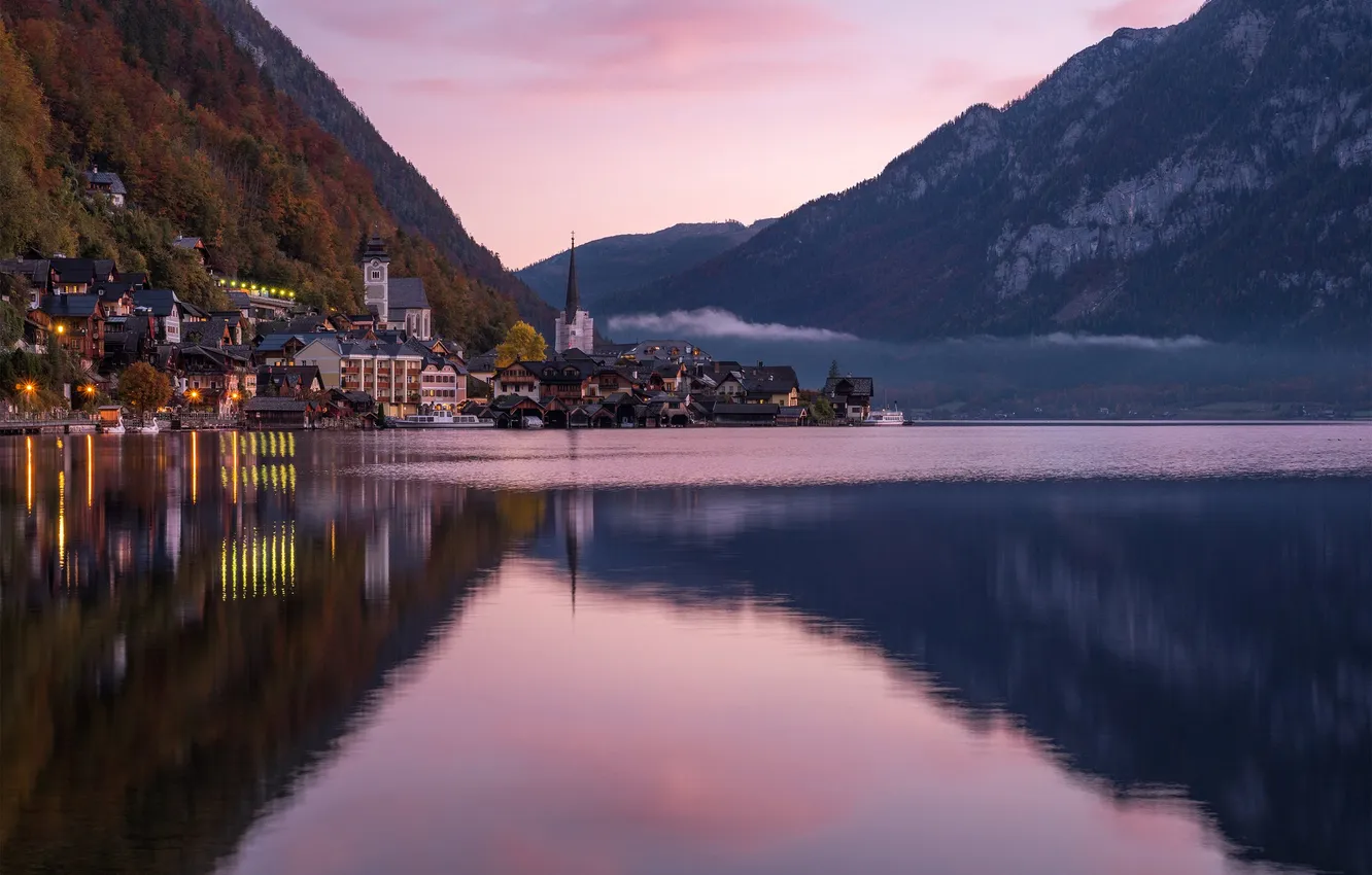 Photo wallpaper autumn, forest, mountains, the city, lights, fog, lake, glare