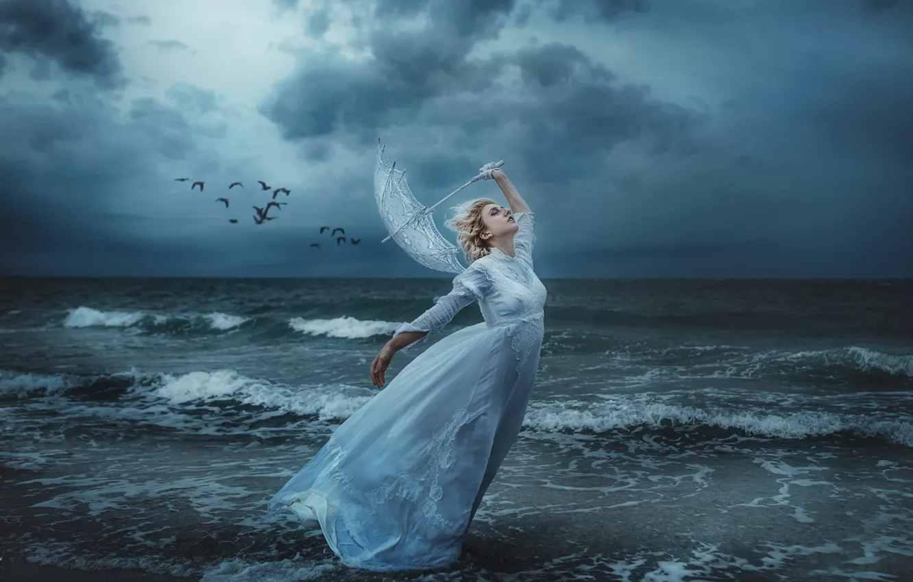 Photo wallpaper sea, girl, birds, storm, the wind, shore, umbrella, TJ Drysdale