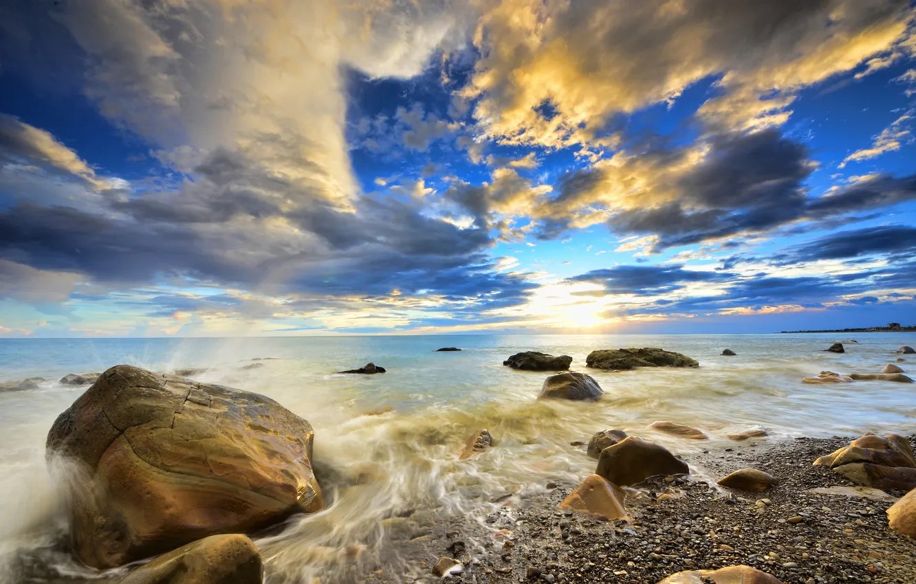 Photo wallpaper sea, wave, the sky, the sun, clouds, squirt, stones, horizon