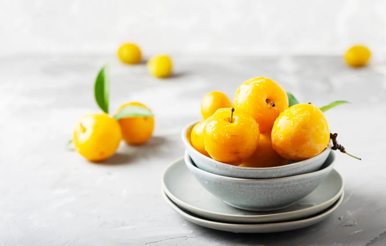 Photo wallpaper yellow, Cup, dishes, fruit, placer, light background, plum, saucer
