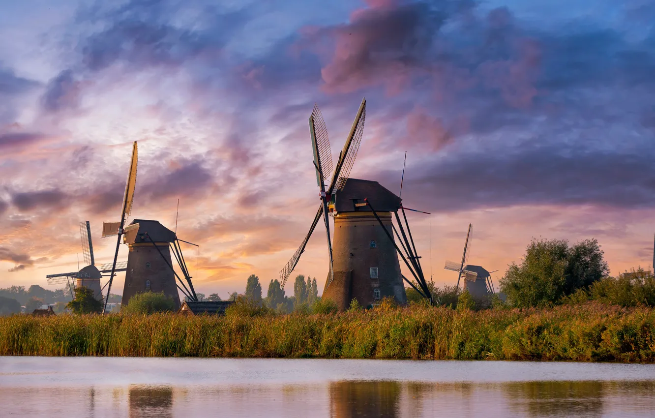 Photo wallpaper the sky, clouds, sunset, river, shore, the evening, mill, haze