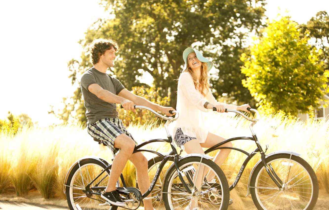 Photo wallpaper woman, male, walk, bikes, couple riding bikes