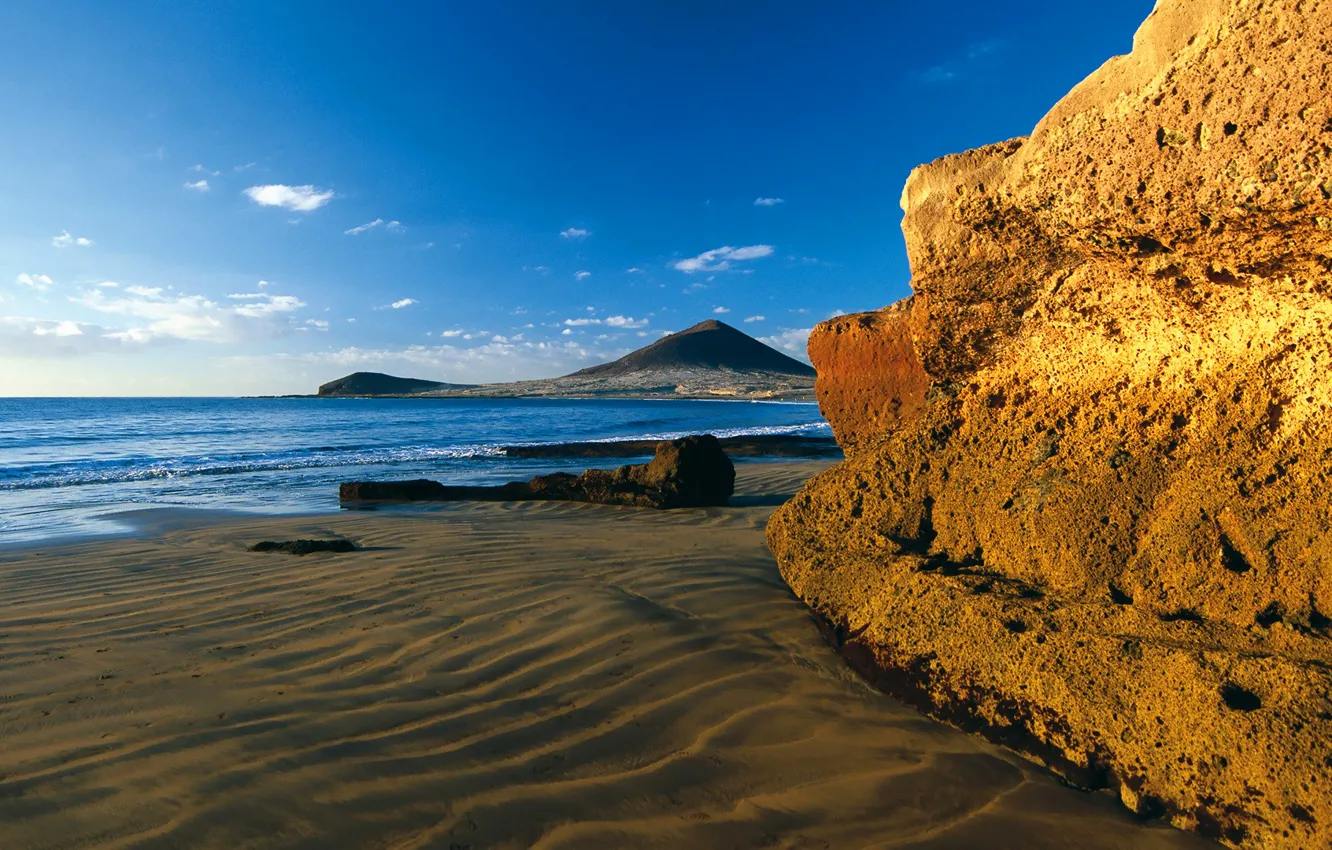 Photo wallpaper sand, sea, the sky, sunset, mountains, stones, rocks, shore