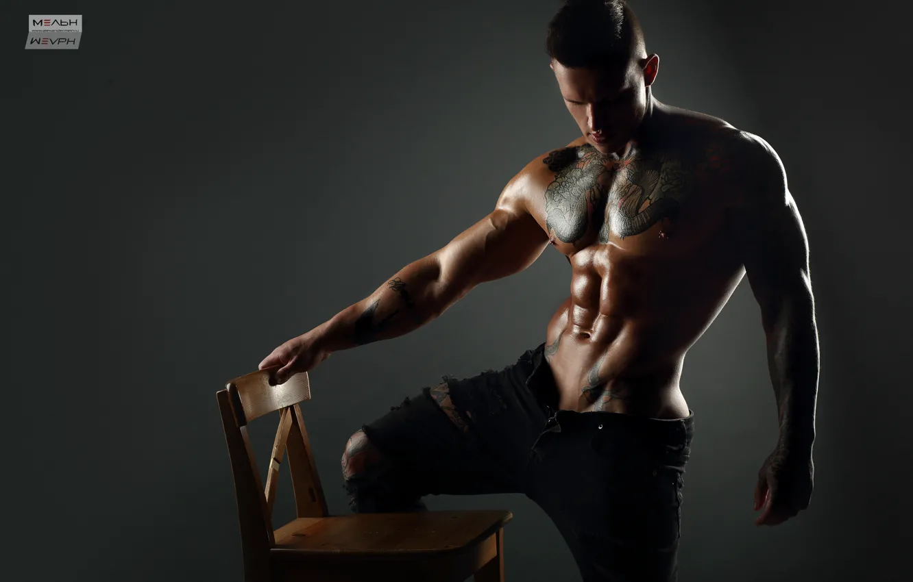 Photo wallpaper pose, background, model, jeans, figure, tattoo, chair, guy