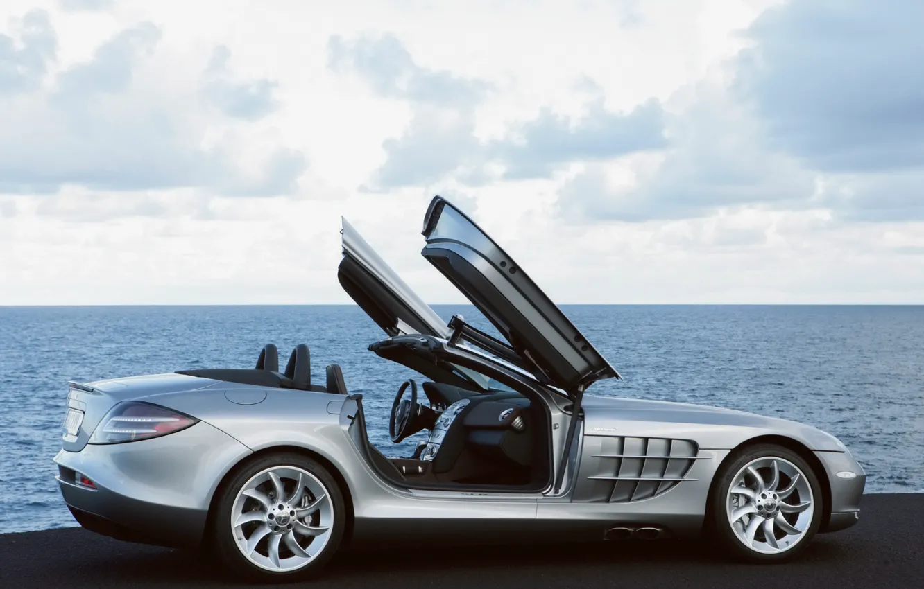 Photo wallpaper sea, auto, wings, the door