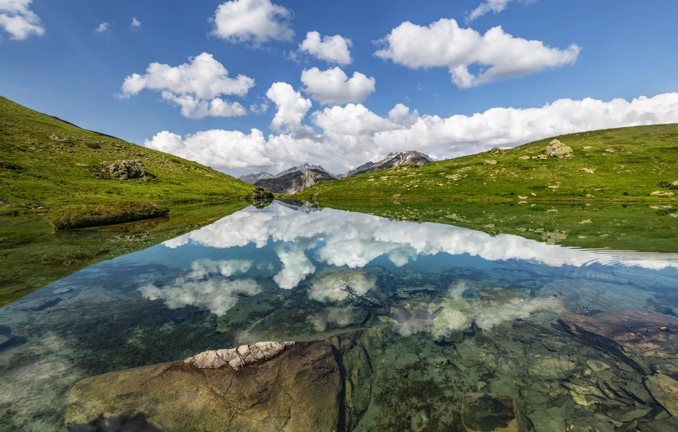 Photo wallpaper clouds, mountains, reflection, stones, shore, pond