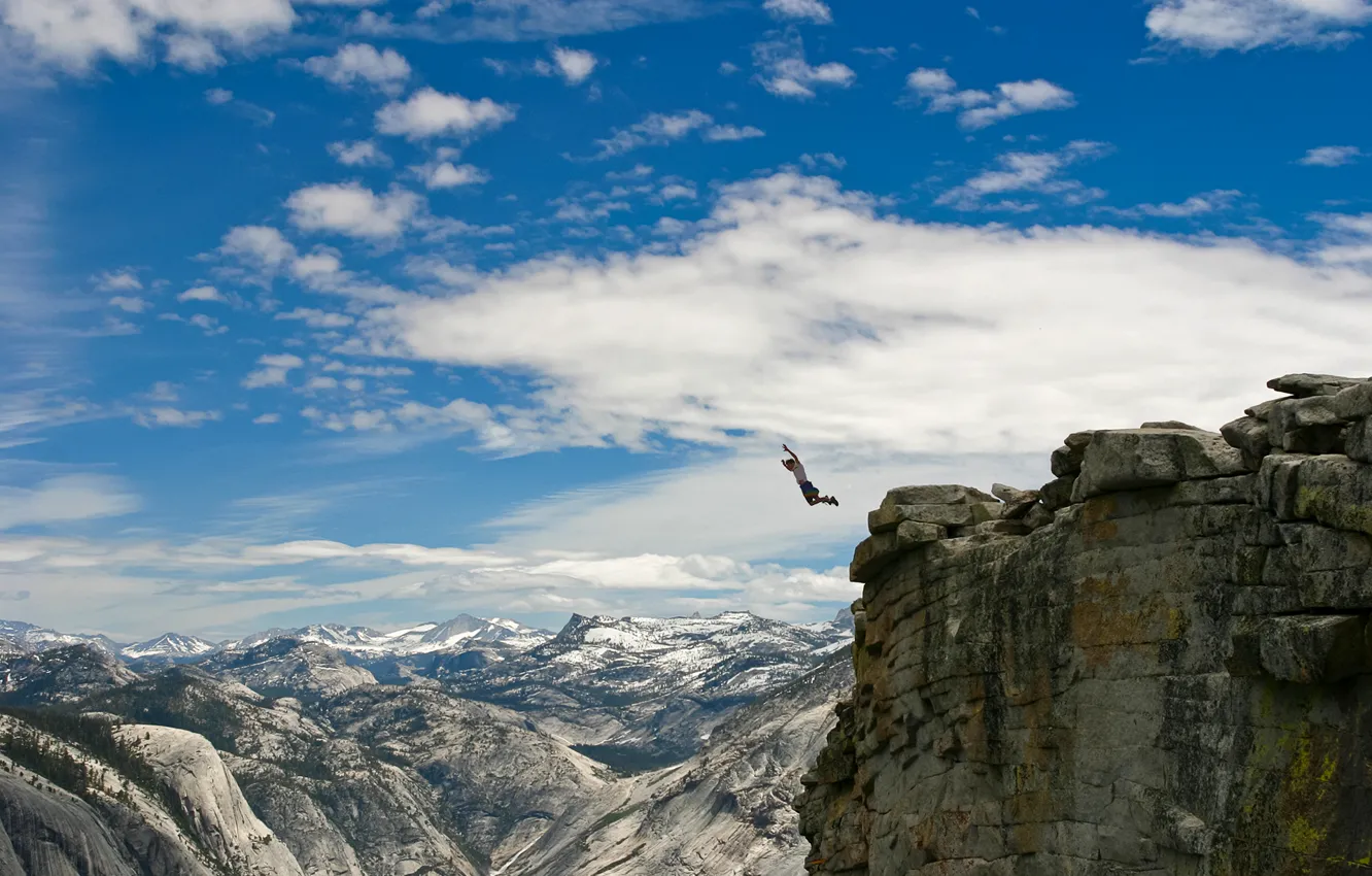 Photo wallpaper mountains, situation, jump, people, guy