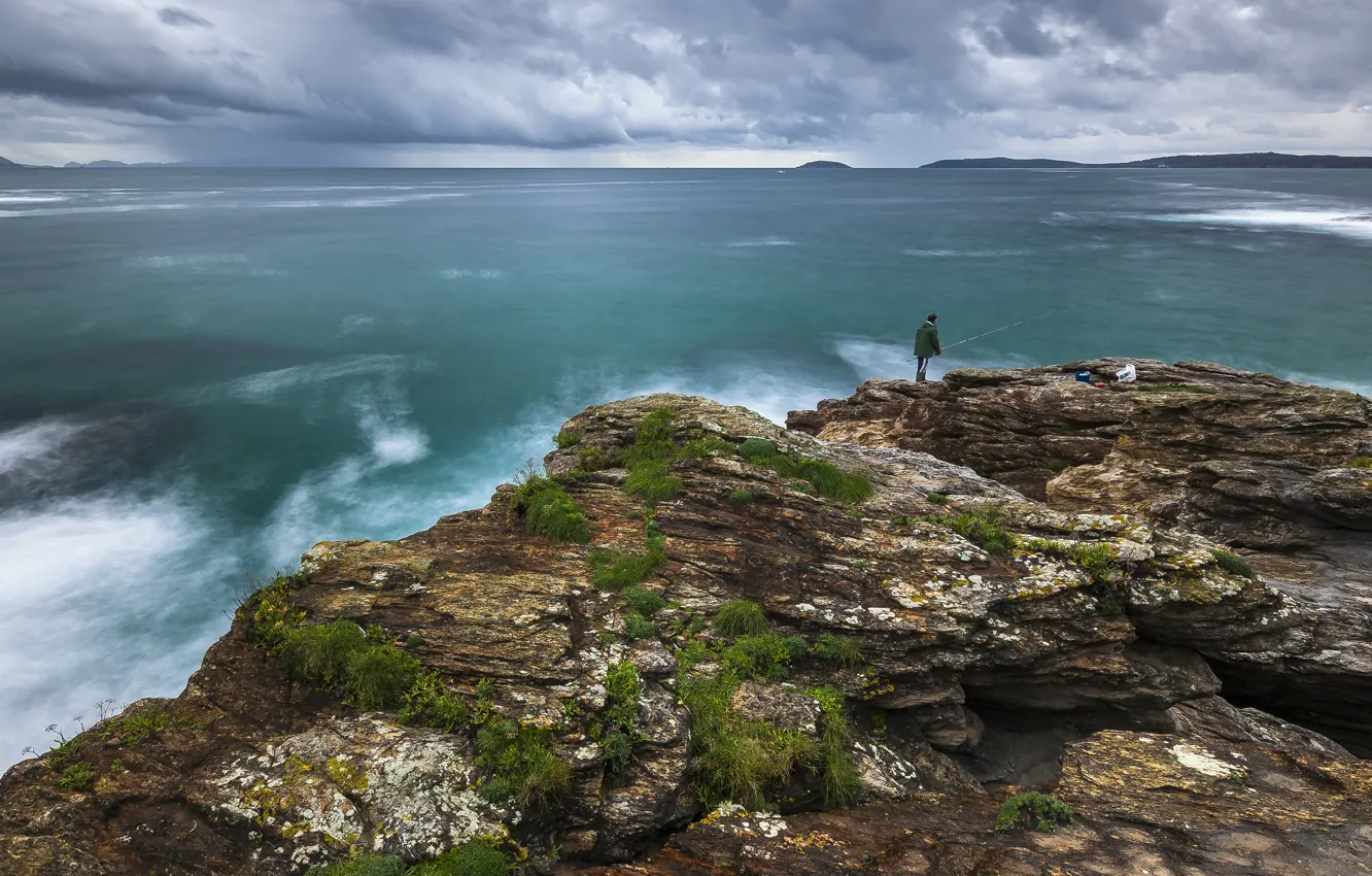 Photo wallpaper sea, clouds, overcast, rocks, shore, vegetation, fishing, people