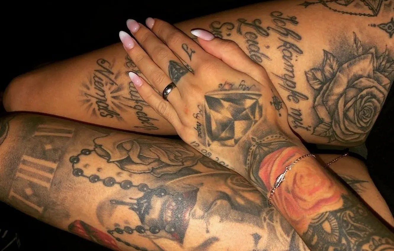 Photo wallpaper girl, the dark background, tattoo, manicure, ring, slender legs, a chain on his arm, tattoos …