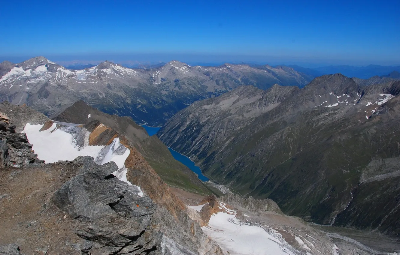 Photo wallpaper the sky, snow, mountains, stones, horizon, Bay, the fjord