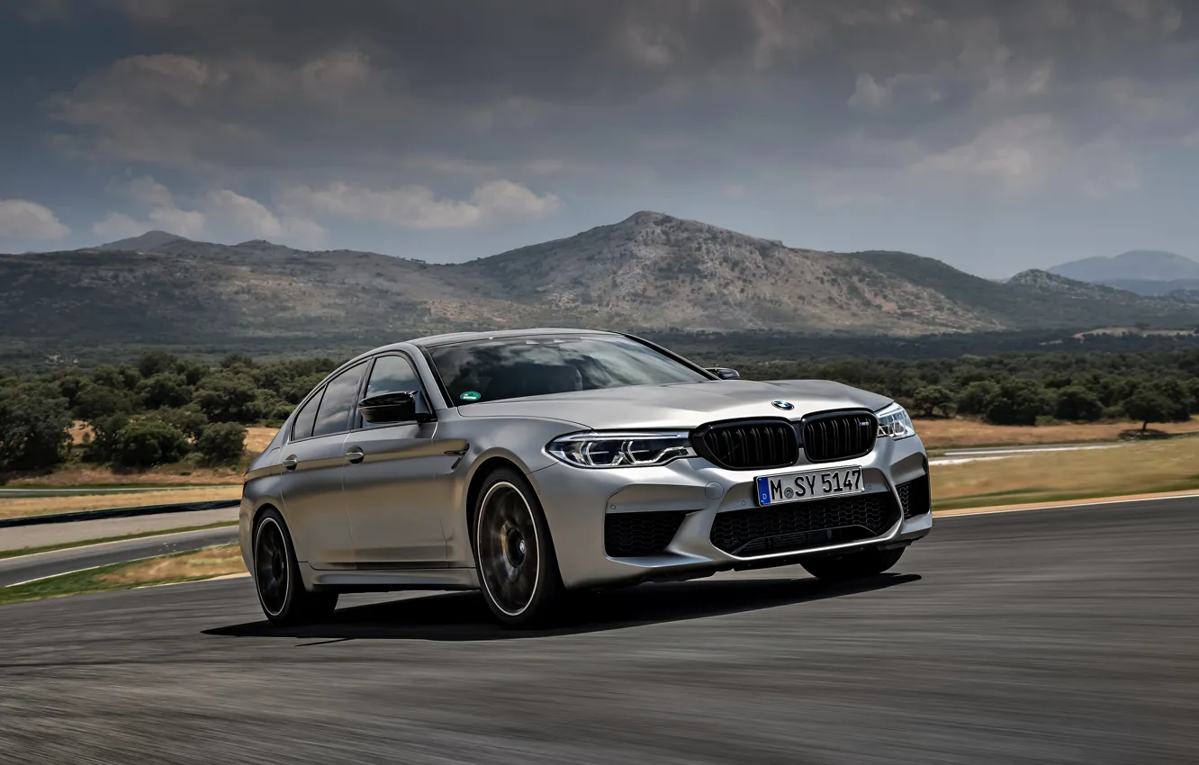 Photo wallpaper clouds, mountains, grey, BMW, sedan, track, relief, 4x4