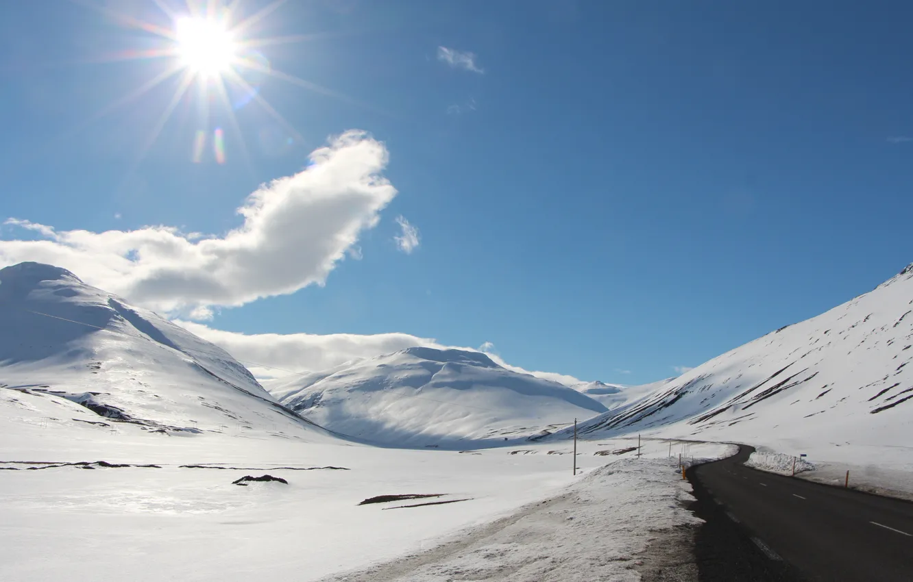 Photo wallpaper road, the sun, snow, hills