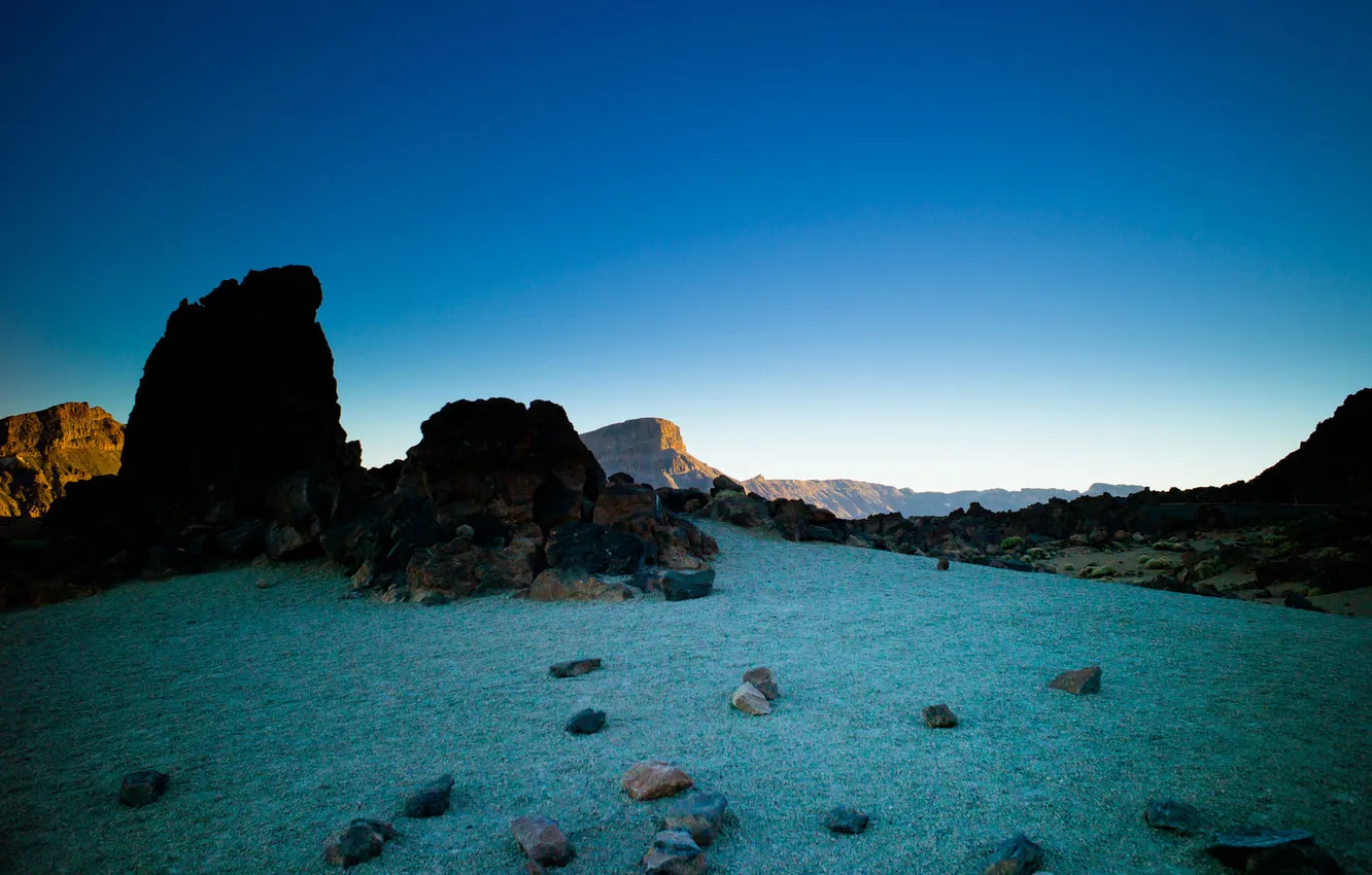 Photo wallpaper grass, sunset, stones, rocks, hills, shadow