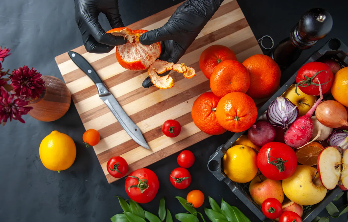Photo wallpaper the dark background, hands, citrus