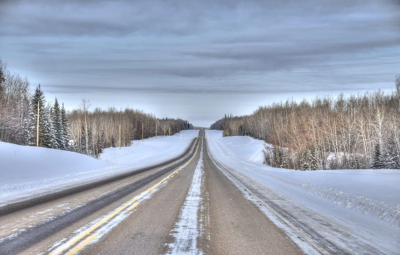 Photo wallpaper winter, road, forest, the sky, asphalt, clouds, snow, trees