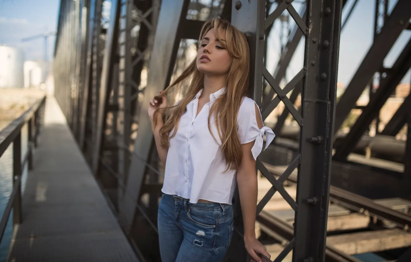 Photo wallpaper girl, bridge, rails, jeans, makeup, figure, hairstyle, railroad