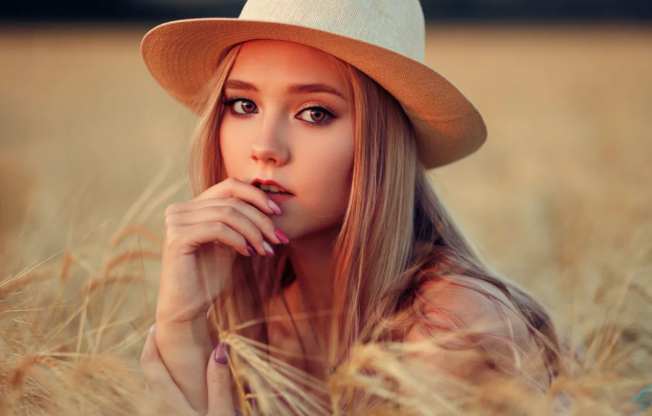 Photo wallpaper field, look, girl, face, portrait, hat, hands, ears