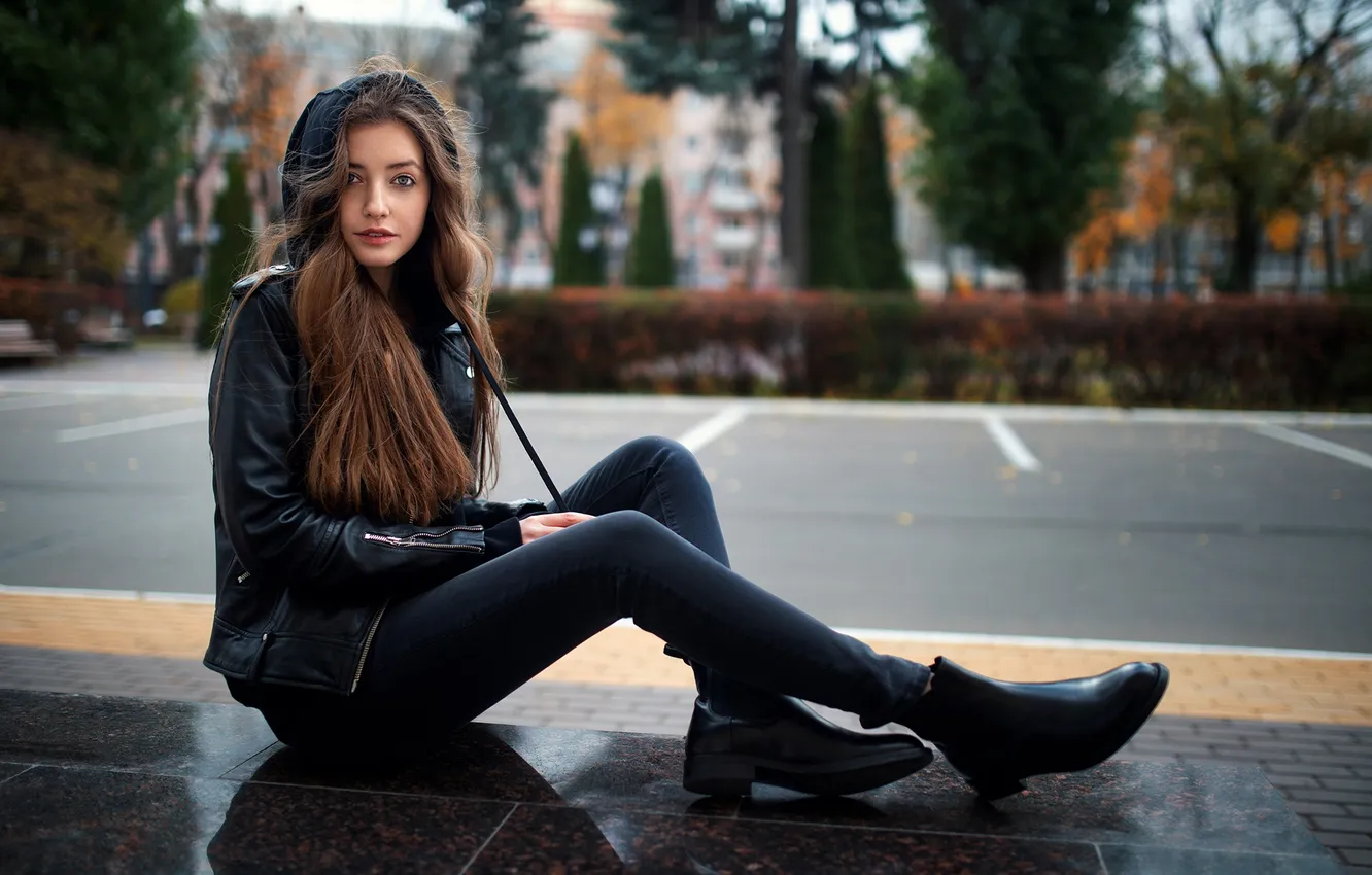 Photo wallpaper girl, trees, model, jeans, urban, sitting, jacket, public
