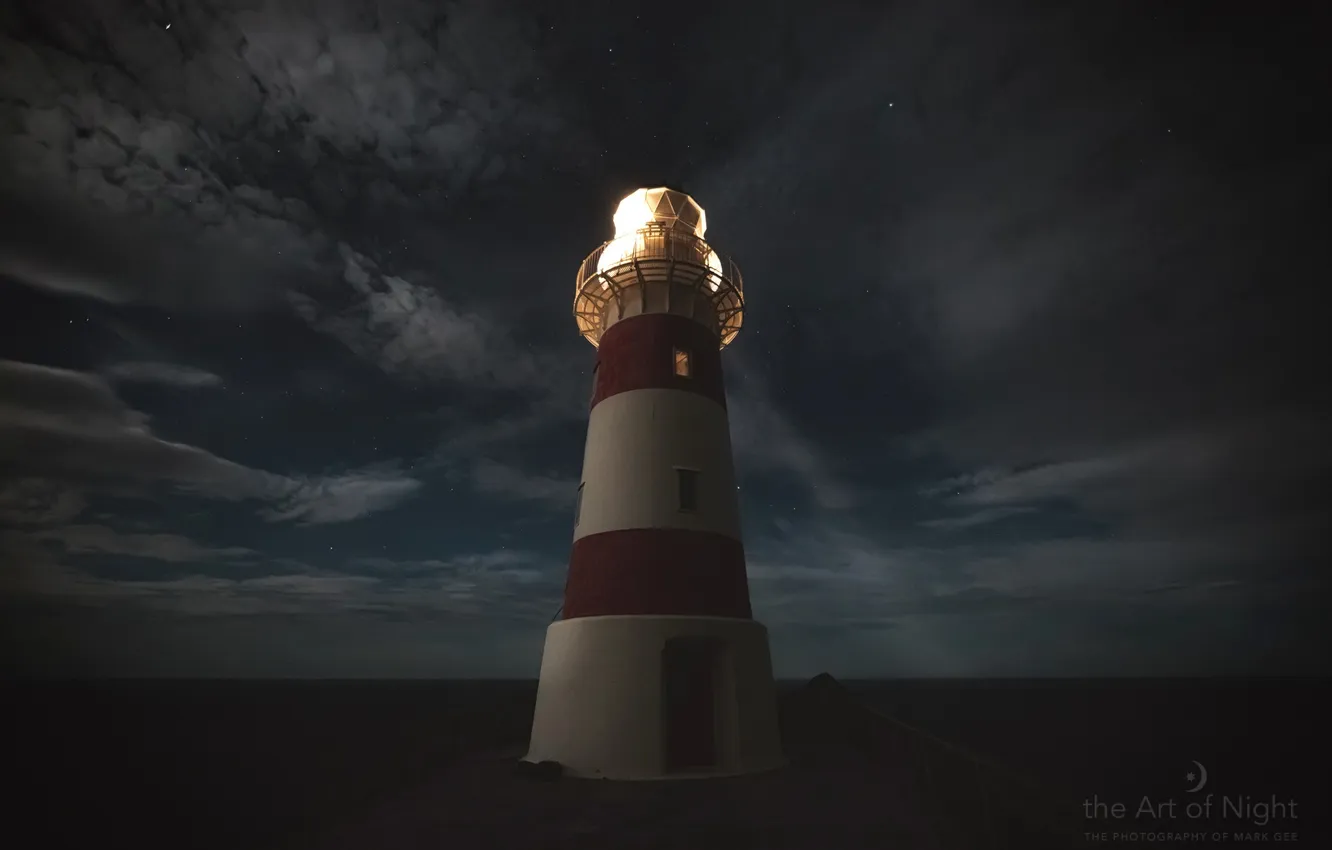 Photo wallpaper the sky, night, clouds, ray, photographer, Mark Gee, a solitary lighthouse