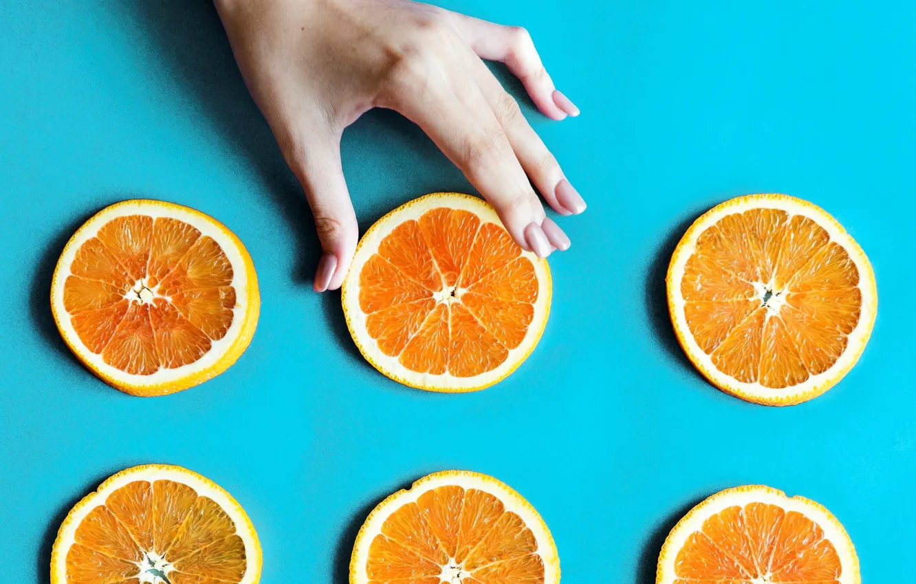 Photo wallpaper hand, oranges, manicure