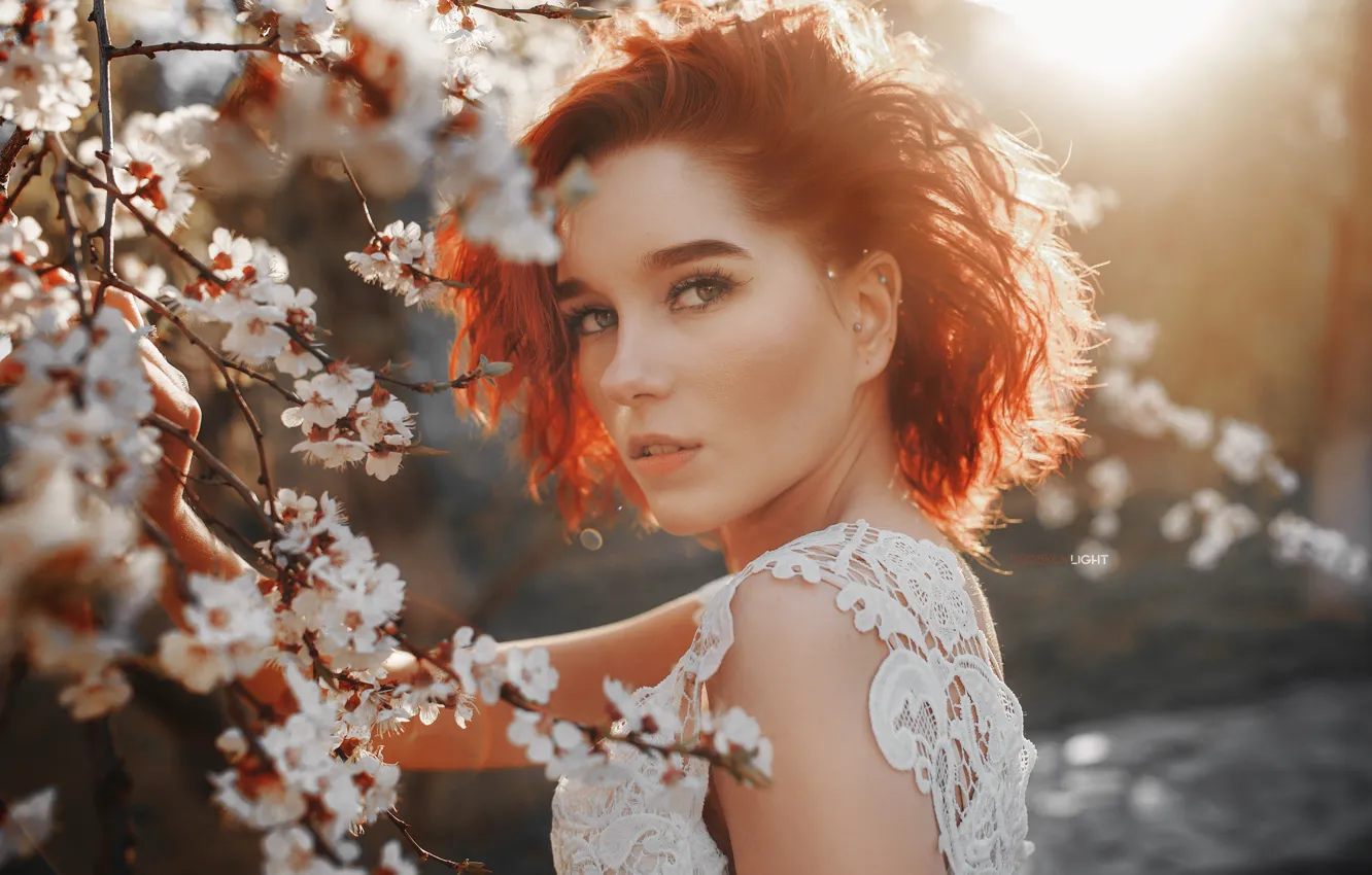 Photo wallpaper look, girl, branches, face, portrait, spring, red, flowering