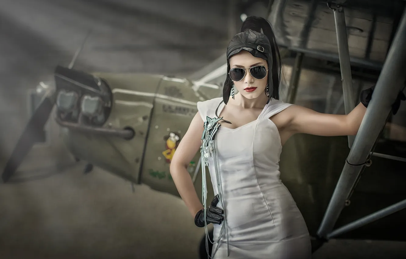 Photo wallpaper girl, pose, glasses, the plane