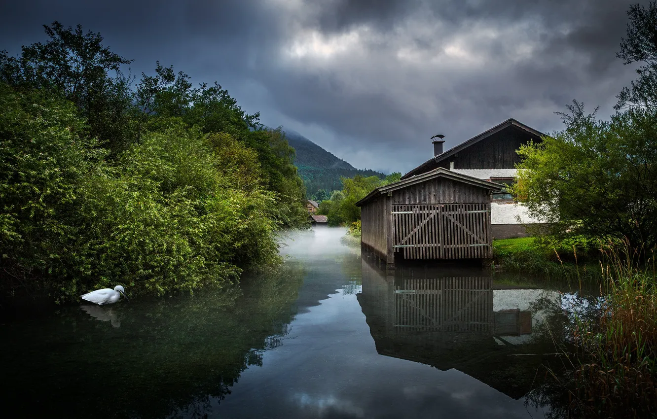 Photo wallpaper home, flowers, gloomy sky, reflection, mountains, shore, channel, haze