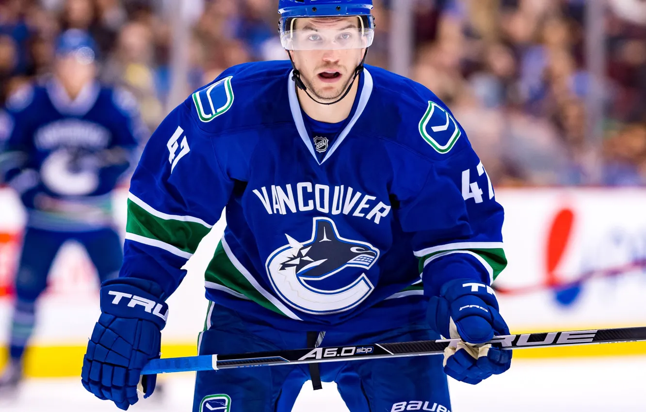 Photo wallpaper hockey player, The Vancouver Canucks, Vancouver Canucks, dark blue uniform