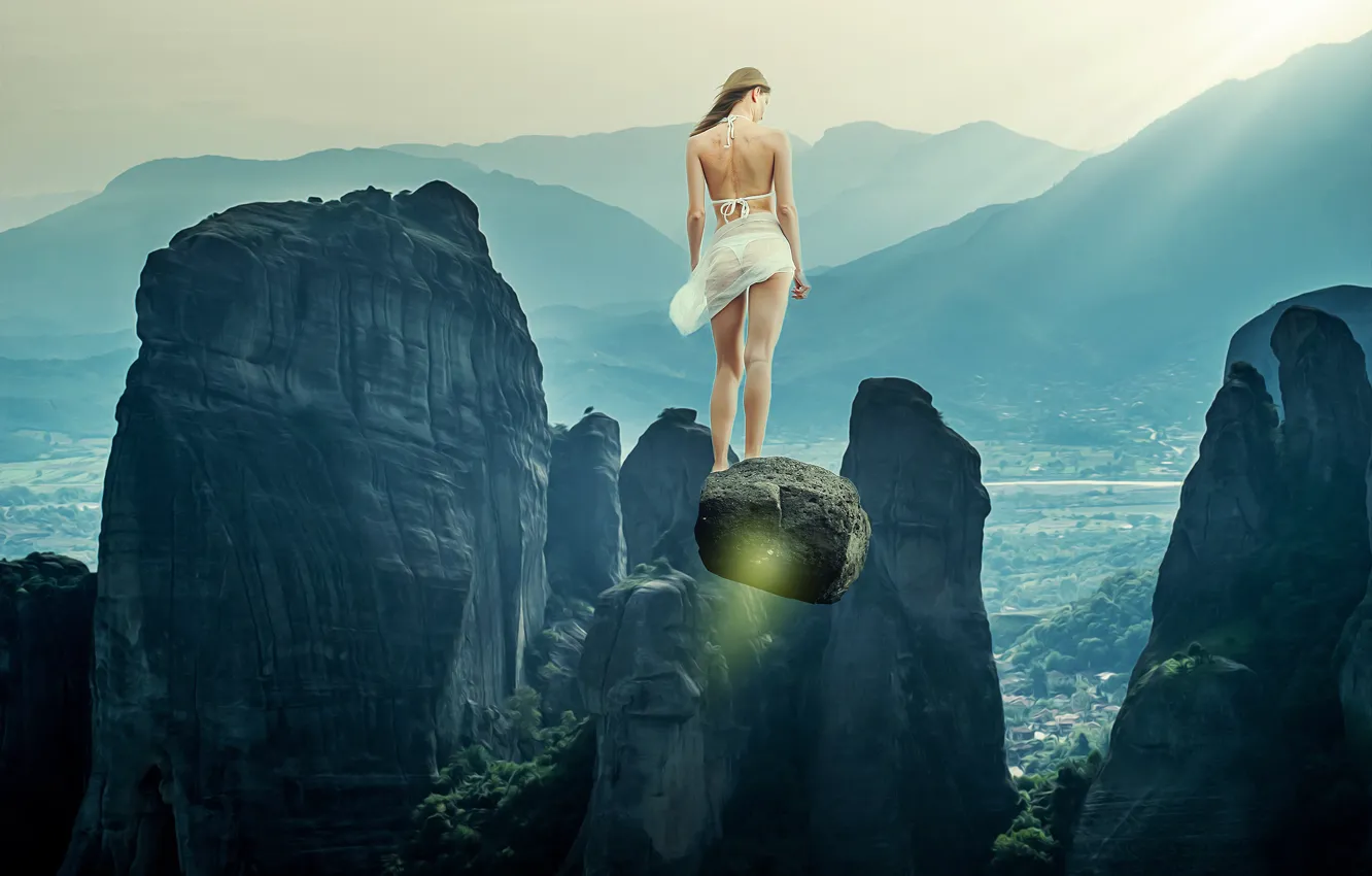 Photo wallpaper girl, light, flight, landscape, mountains, fog, stones, fiction