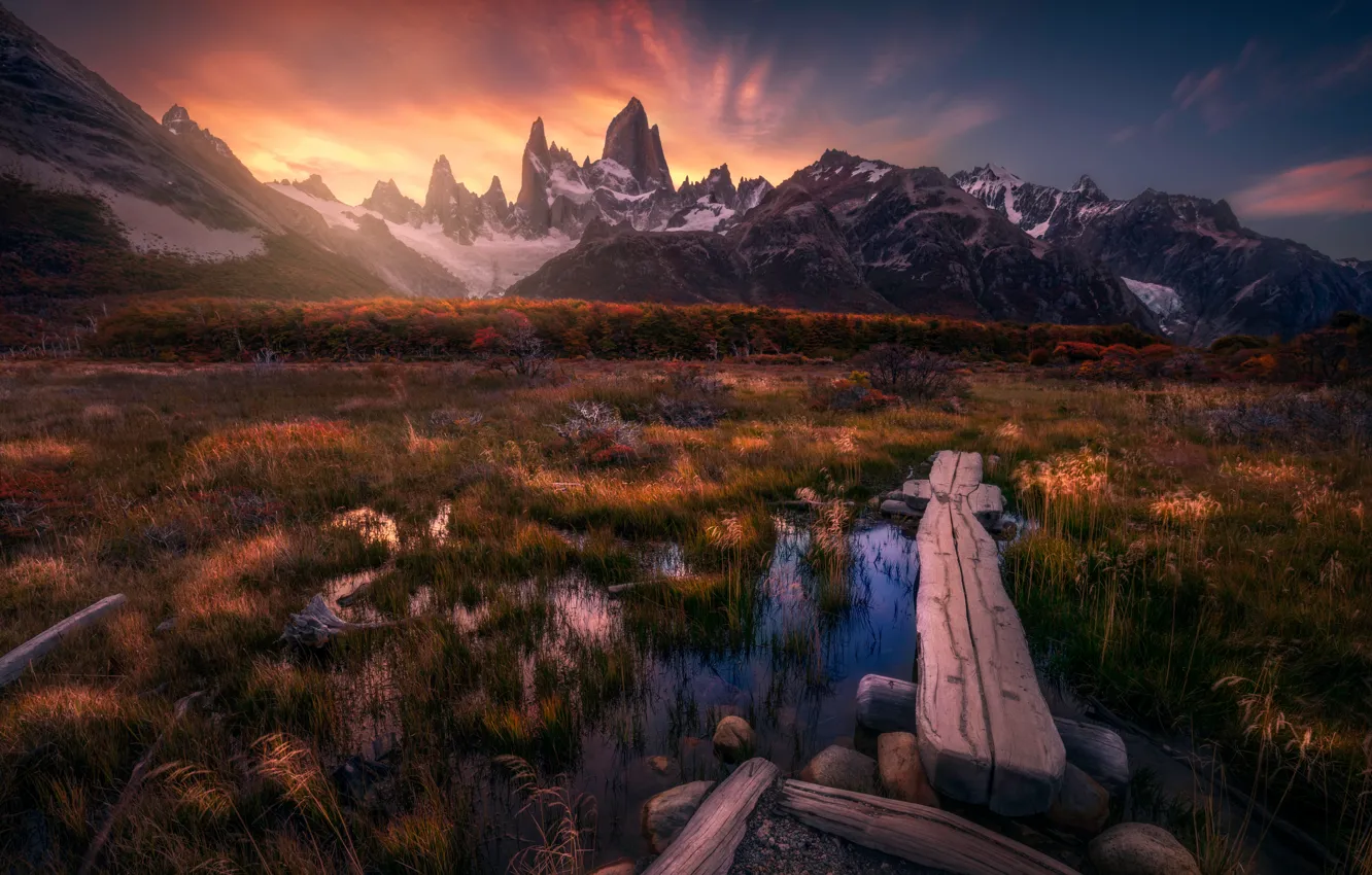 Photo wallpaper autumn, grass, clouds, sunset, mountains, Board, swamp, the bushes