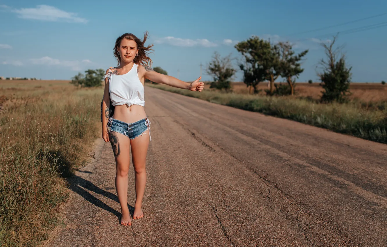 Photo wallpaper girl, road, Model, shorts, long hair, legs, trees, field