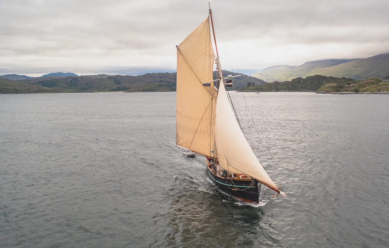 Photo wallpaper the way, movement, overcast, the ocean, the wind, coast, ship, sailboat