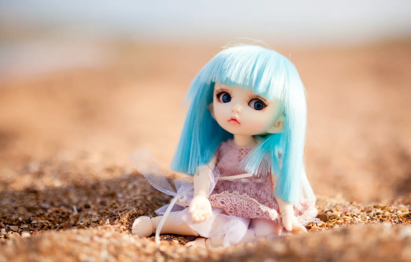 Photo wallpaper sand, toy, doll, sitting, blue hair