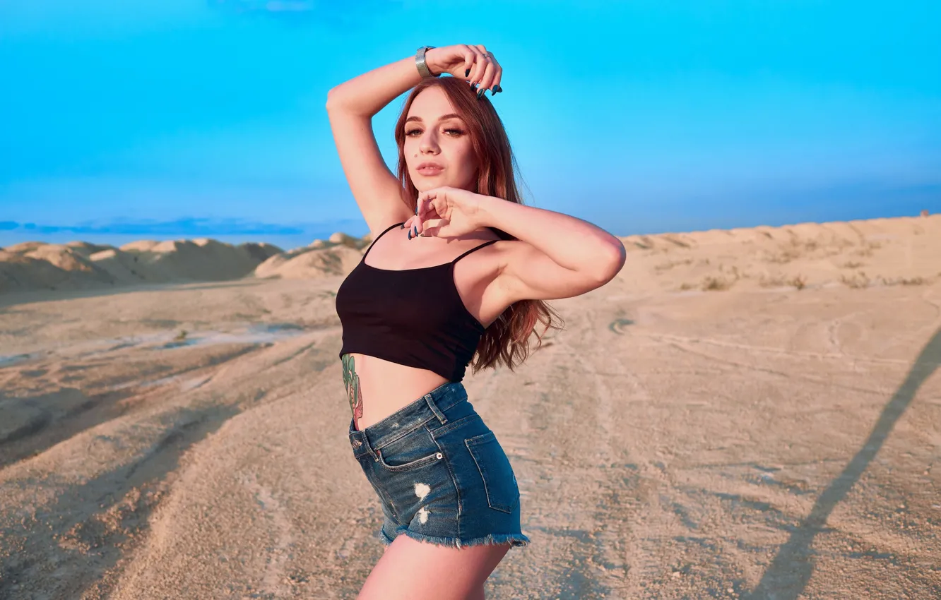 Photo wallpaper sand, girl, pose, shorts, hands, tattoo, top, long hair