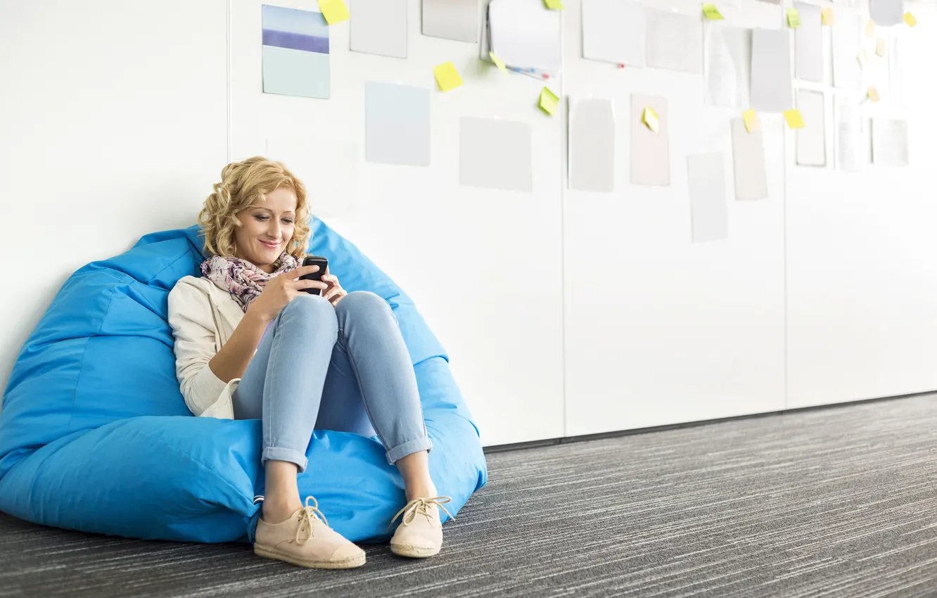 Photo wallpaper girl, pose, sneakers, jeans, chair, makeup, jacket, hairstyle