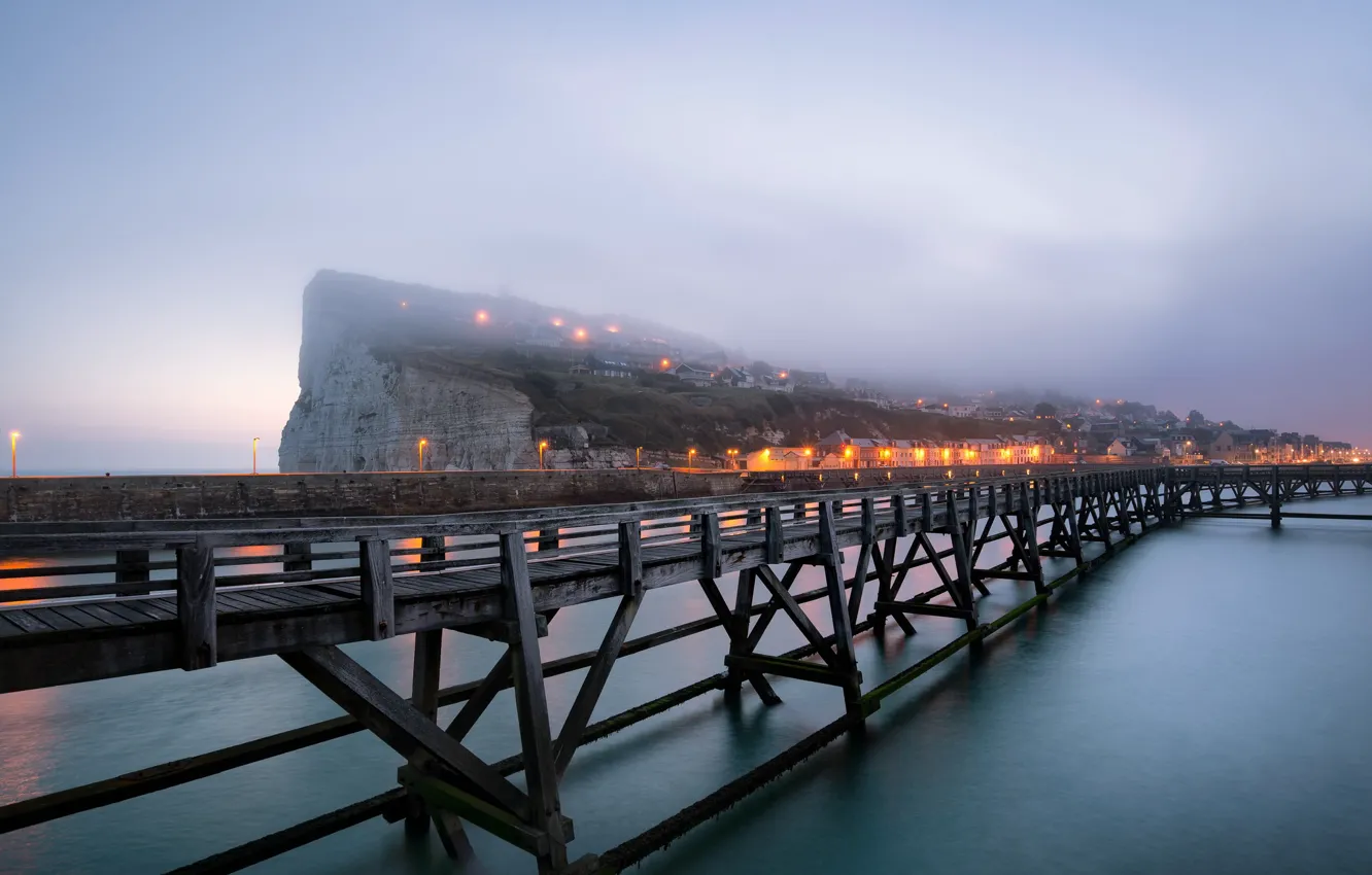 Photo wallpaper sea, bridge, the city, lights, fog, shore