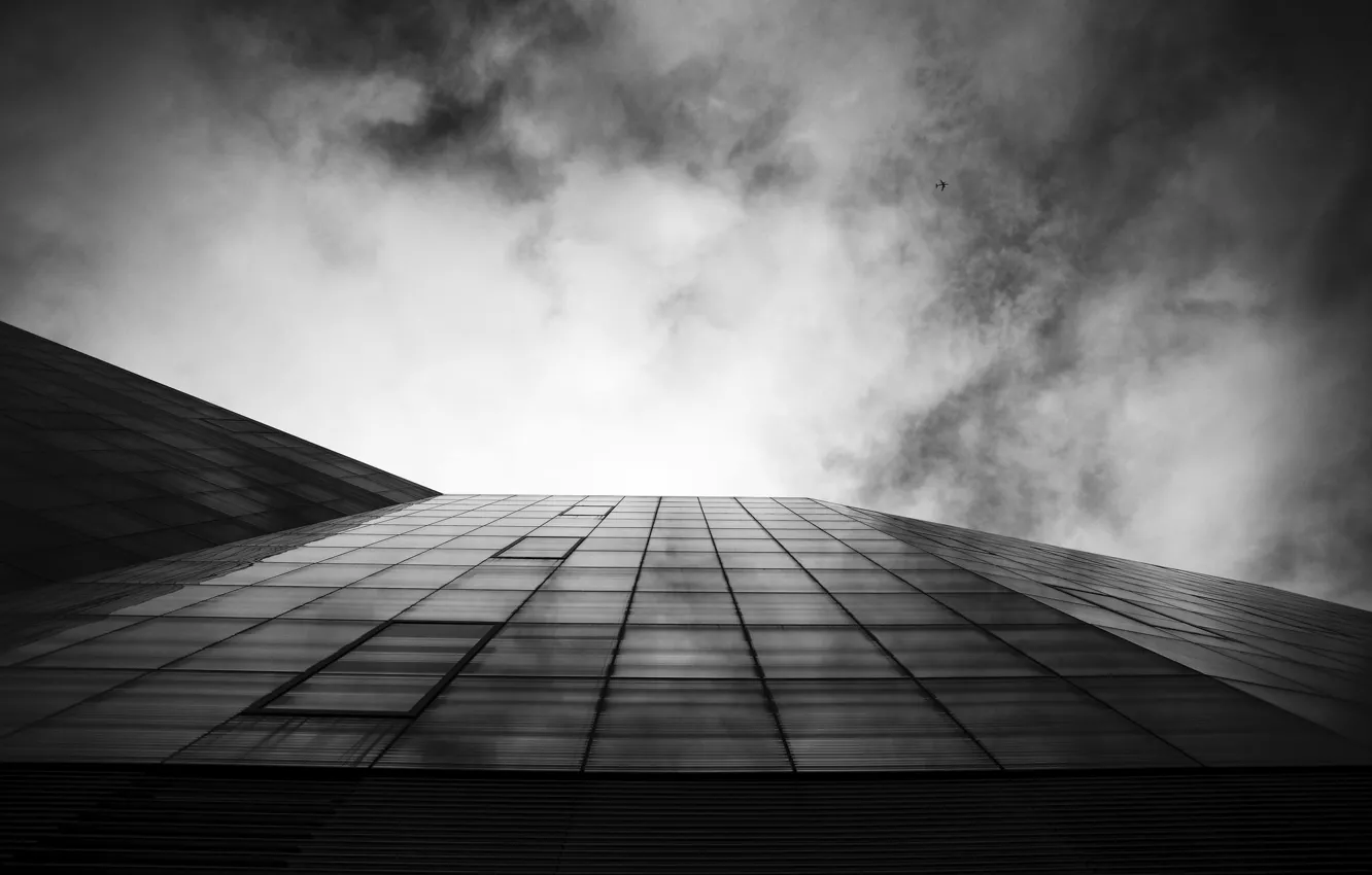 Photo wallpaper the sky, clouds, the plane, the building, Windows, skyscraper, black and white